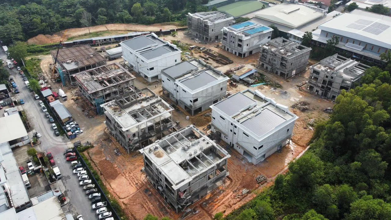 Aerial view of the Suria 22 Balakong industrial park under construction, showing completed and in-progress semi-detached factory blocks